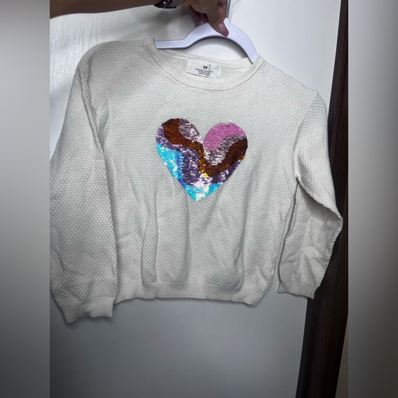 H&M Cream Sweater with Multicolor Sequin Heart 
And dark red top. - Picture 2 of 7